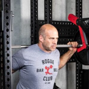 Picture of man performing back squats using Rogue AM 2 Adjustable Monolith