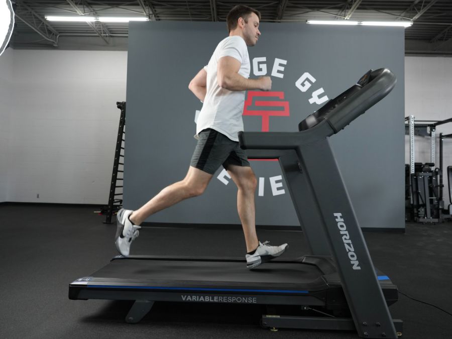 An image of a man running on a treadmill
