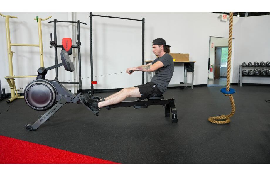 man using proform 750r rower