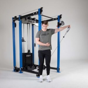 Man performing exercises on the Rep Fitness Ares Cable Attachment