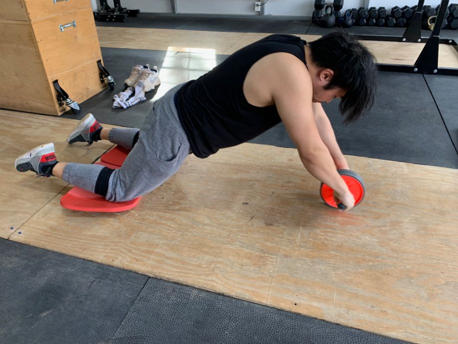 Man using WOD Nation ab roller