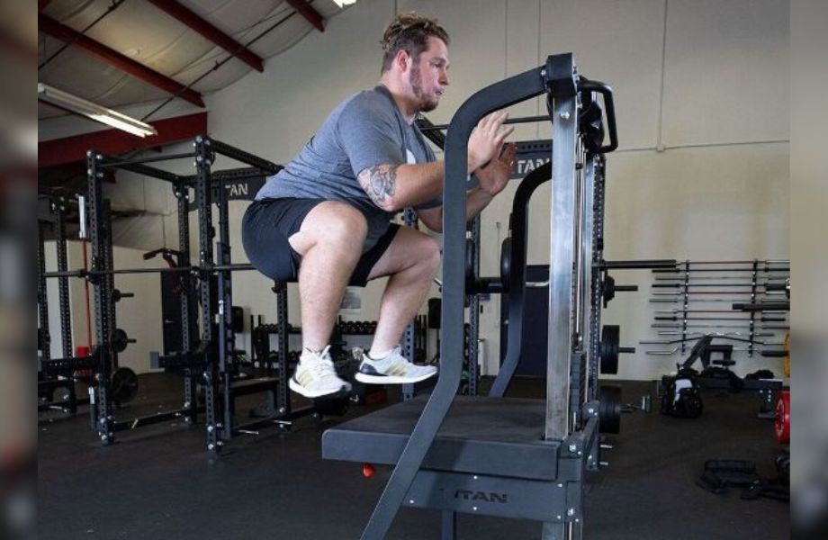 man jumping on Titan plyo box