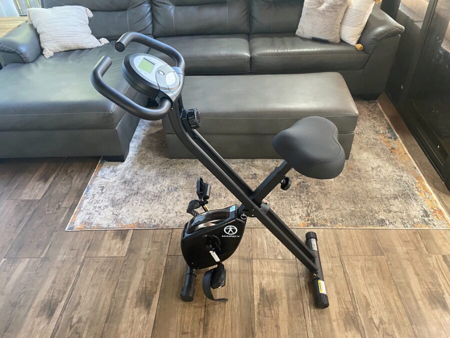 The Marcy Foldable Exercise Bike in a living room