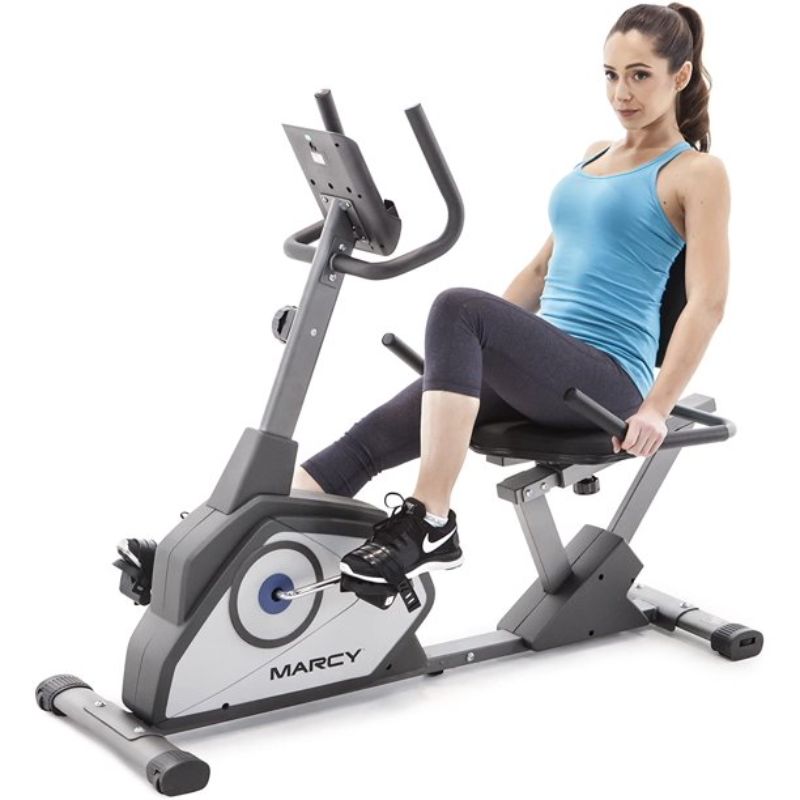 woman on a Marcy magnetic recumbent exercise bike
