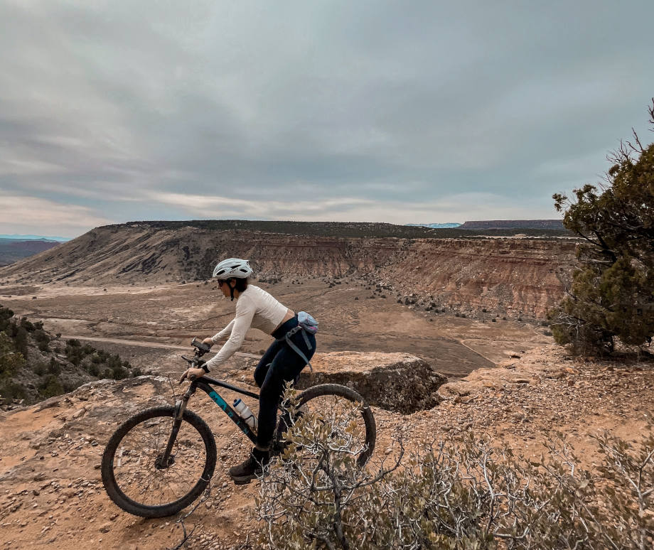 Expert tester Amanda Capritto rides a Marin Bobcat Trail 3 along a canyon ridge.