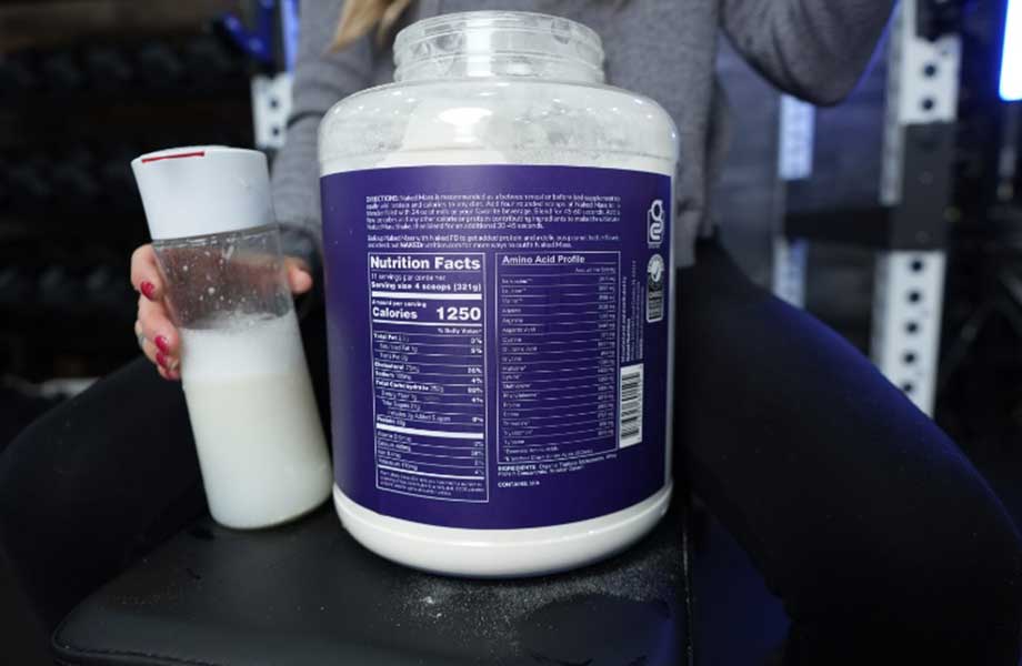 The Supplement Facts label on a canister of Naked Nutrition Naked Mass gainer.