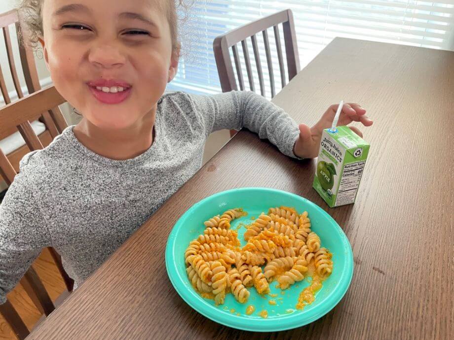 Nicole's Daughter Eating Little Spoons Mac And Cheese