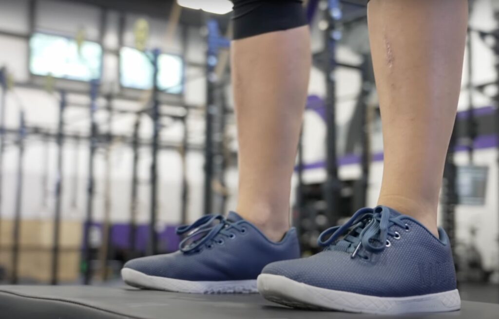 Woman wearing NOBULL training shoes in the gym