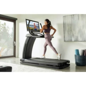 nordictrack elite treadmill 32 woman running