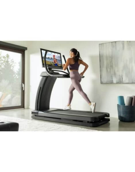 nordictrack elite treadmill 32 woman running