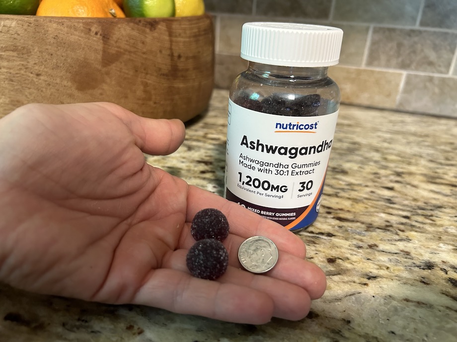 An image of Nutricost ashwagandha gummies by a dime