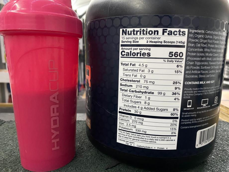 The Nutrition Facts label is shown on a can of Rival Nutrition Clean Gainer.