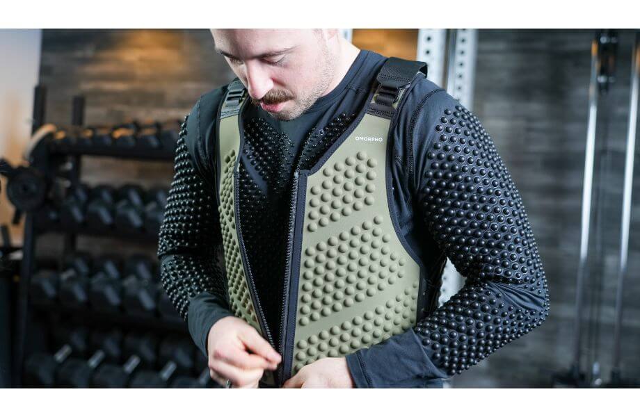 omorpho clothing coop putting on vest