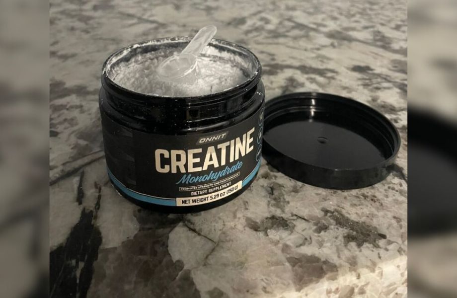 onnit creatine product shot on a marble countertop 