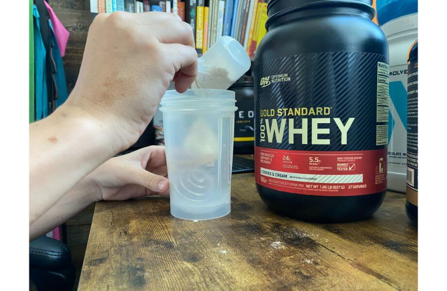 optimum nutrition whey in a shaker bottle
