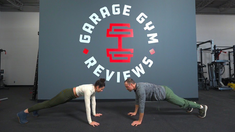 Two people demonstrating partner plank high fives
