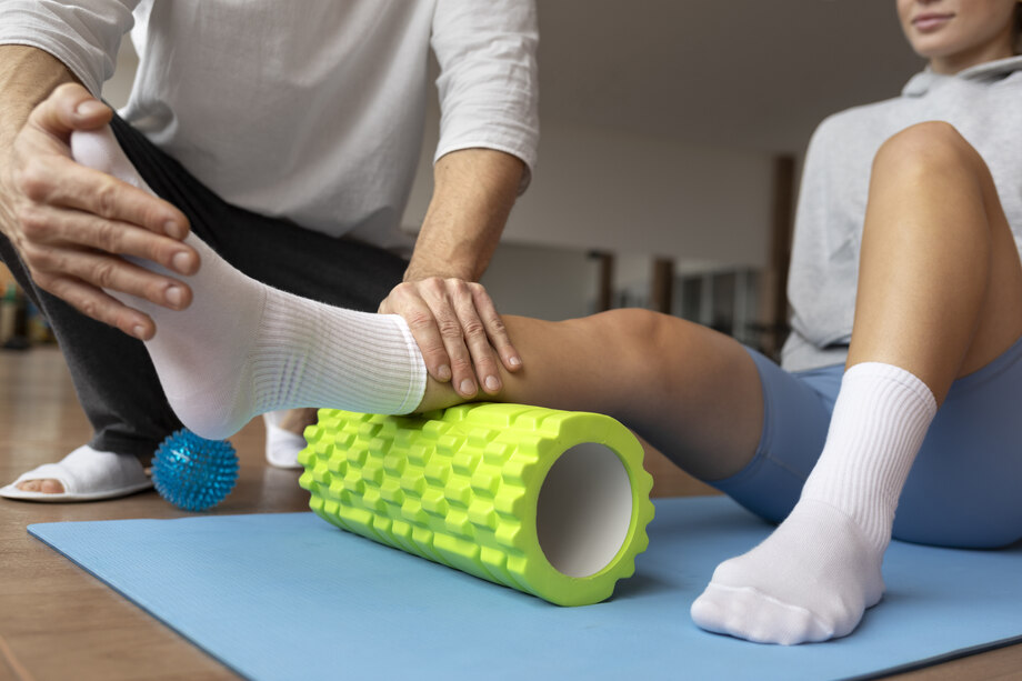 patient-doing-physical-rehabilitation-helped-by-therapists