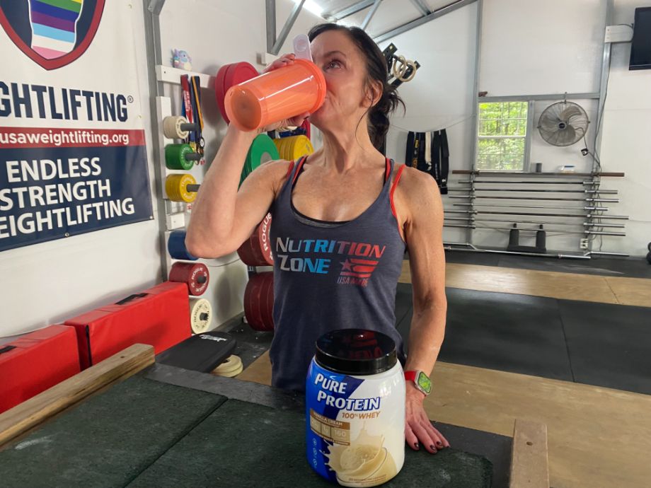 Person drinking Pure Protein Powder