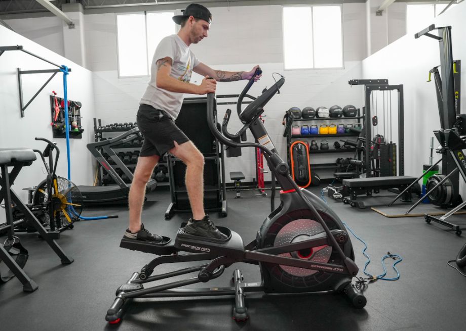 person using schwinn 470 elliptical