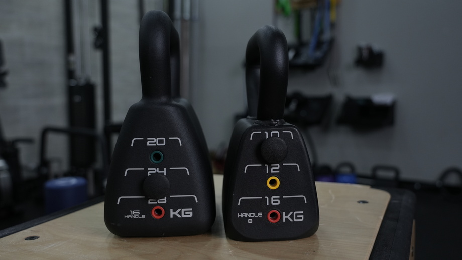 Two PowerBlock Adjustable Kettlebells are shown side by side.
