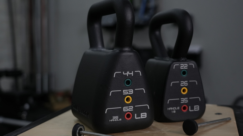 A close up side view of the PowerBlock Adjustable Kettlebells.