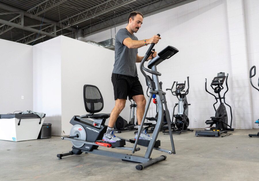 Man using the ProForm Hybrid Trainer XT as an elliptical