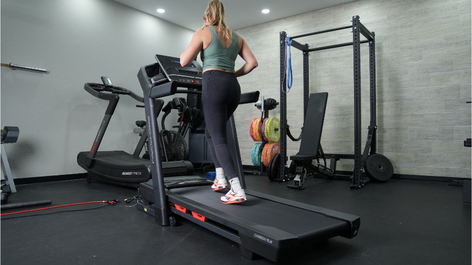 An image of a woman running on the ProForm TLX treadmill