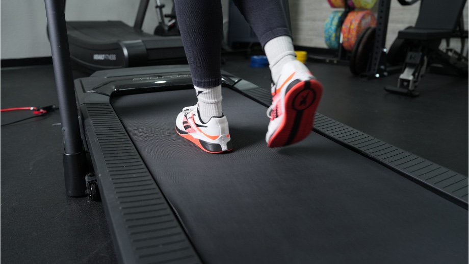 An image of feet on the ProForm TLX treadmill belt