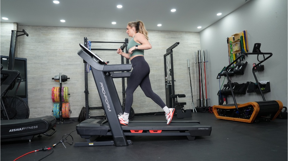 An image of a woman running on the ProForm TLX treadmill with no incline