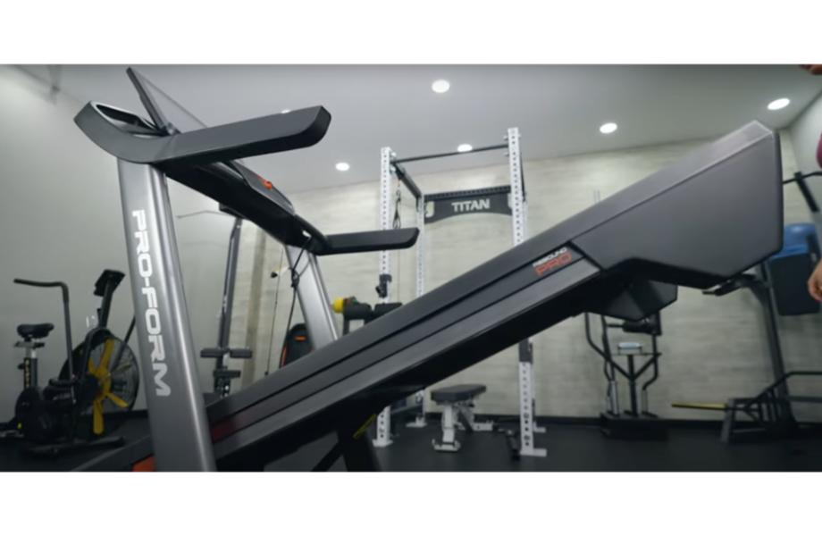 The Proform Pro 9000 Treadmill in the process of unfolding