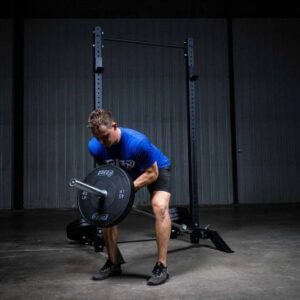 a man in blue using the PRX squat stand