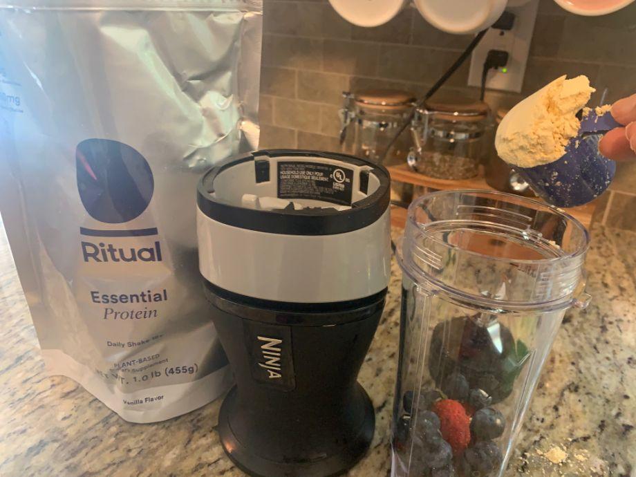 Putting Ritual Protein Powder into a blender