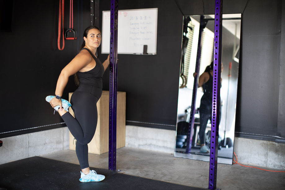 woman doing quad stretch