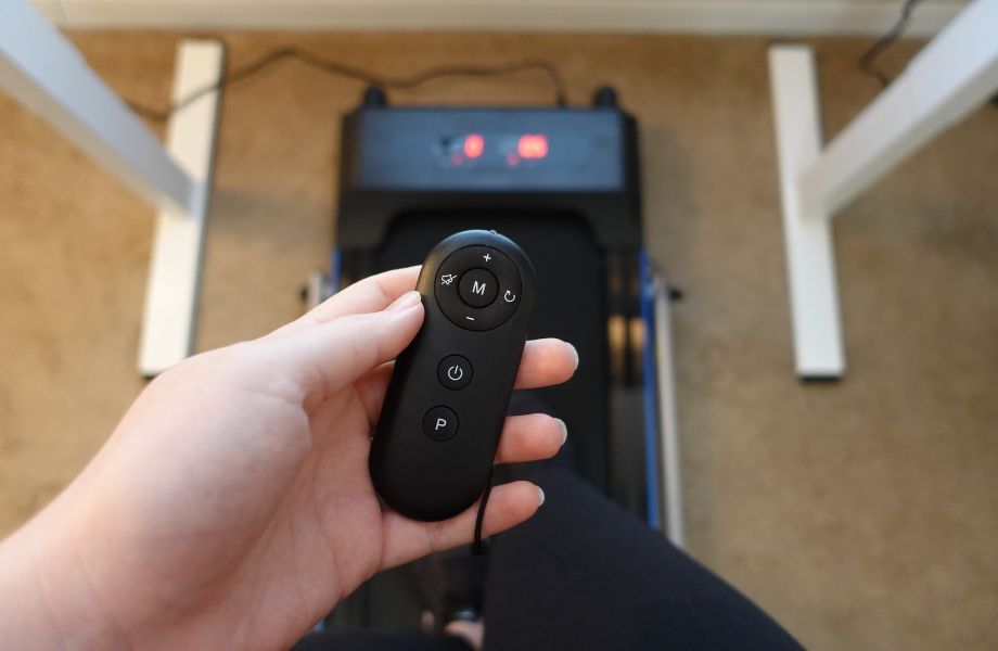 REDLIRO Treadmill remote in hand