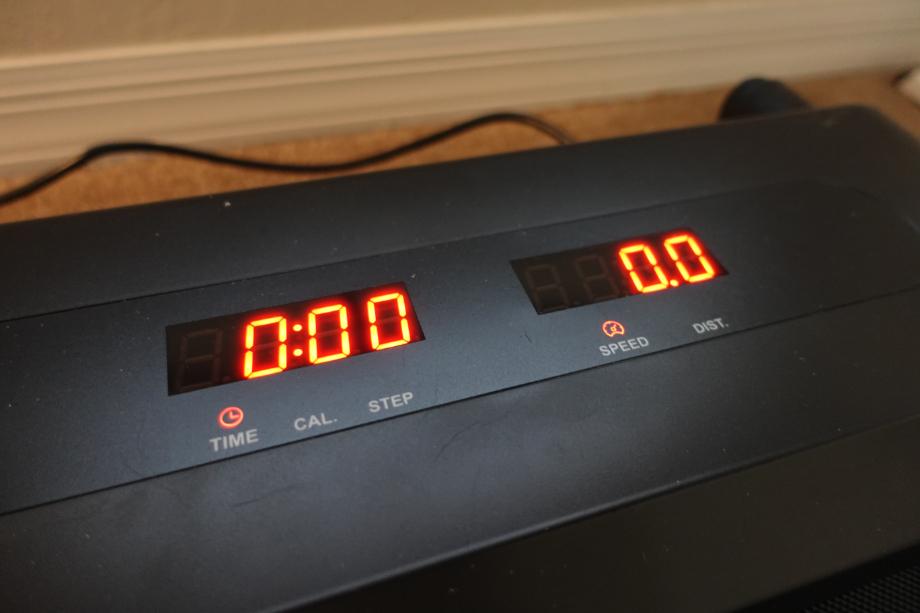 A close up view of the display panel on the REDLIRO Under Desk Treadmill.