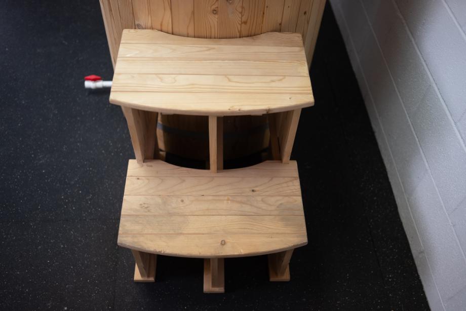 The step-ladder on the Redwood Outdoors Alaskan Cold-Plunge Tub.