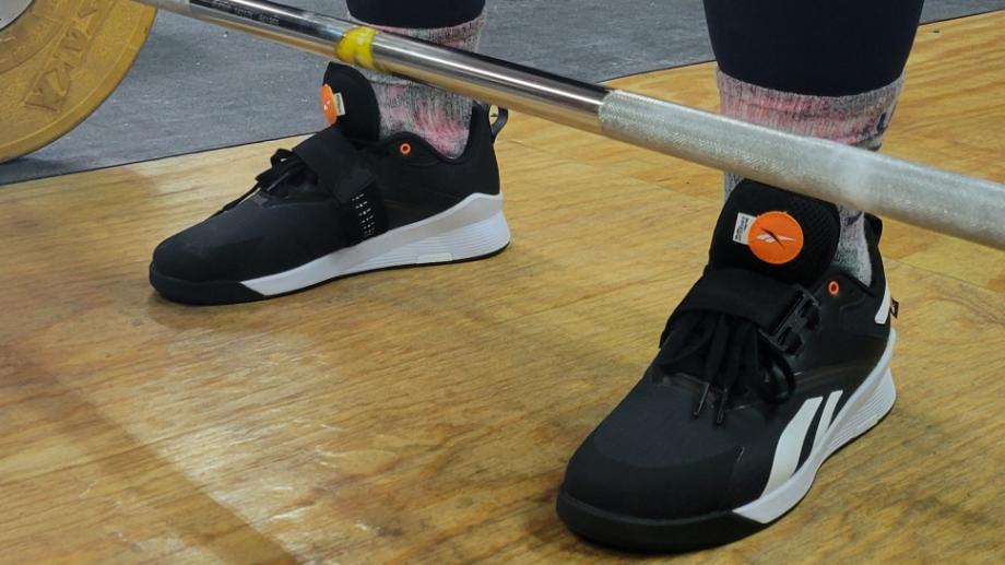 A close look at Reebok Lifter PR 3 weightlifting shoes in use.
