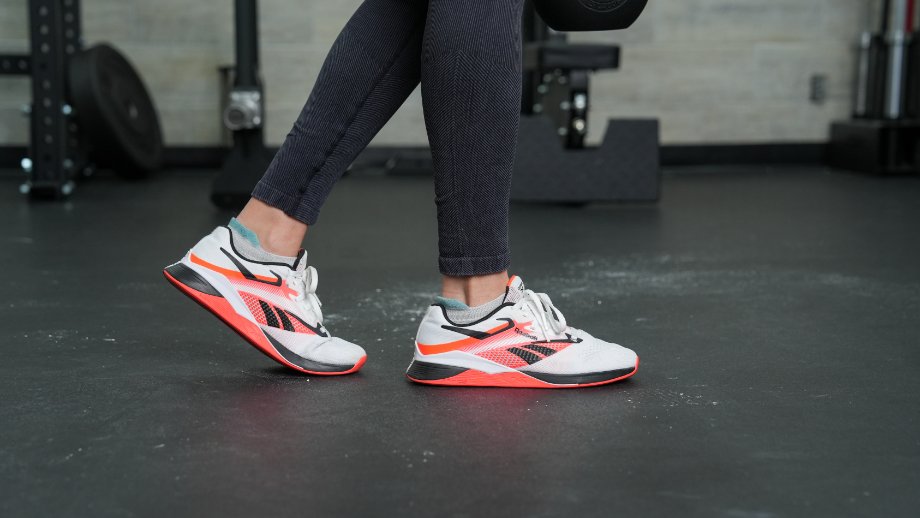 A close up of feet walking while wearing the Reebok Nano X4 cross-training shoes.