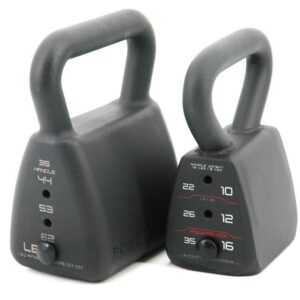 Up close photo of regular and heavy powerblock adjustable kettlebells