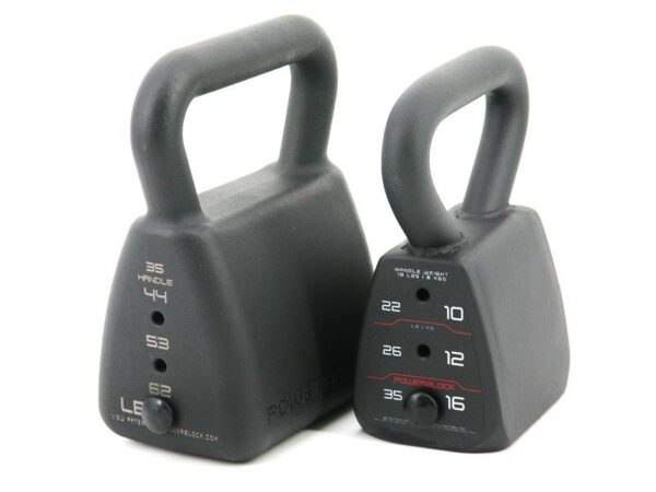 Up close photo of regular and heavy powerblock adjustable kettlebells