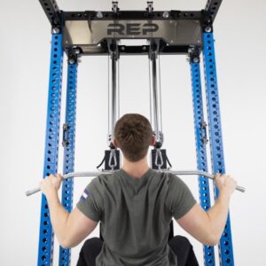 Man doing lat pulldowns with the Rep Fitness Ares Cable Attachment