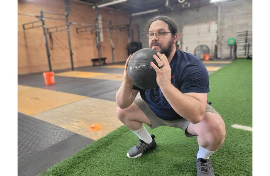 rep ball squat