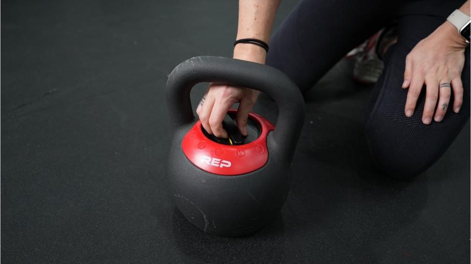 Adjusting the REP Fitness Adjustable Kettlebell.