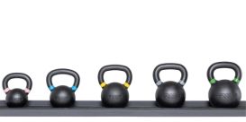 a set of color coded REP fitness kettlebells