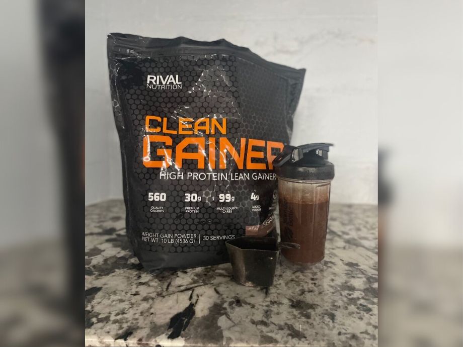 Image of Rival Nutrition Clean Gainer with a shaker bottle