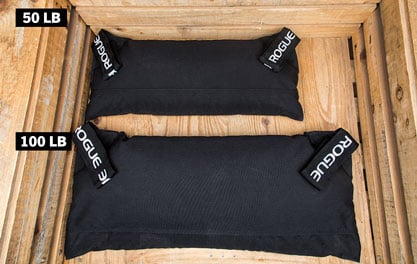 Rogue Feed Bags shown in black in both 50 and 100 pound increments.