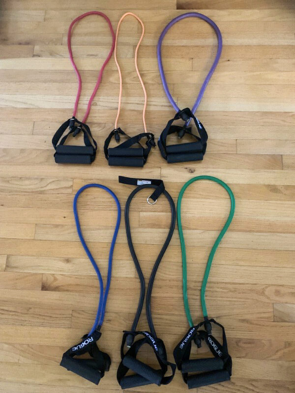 Rogue Tube resistance bands on the hardwood floor