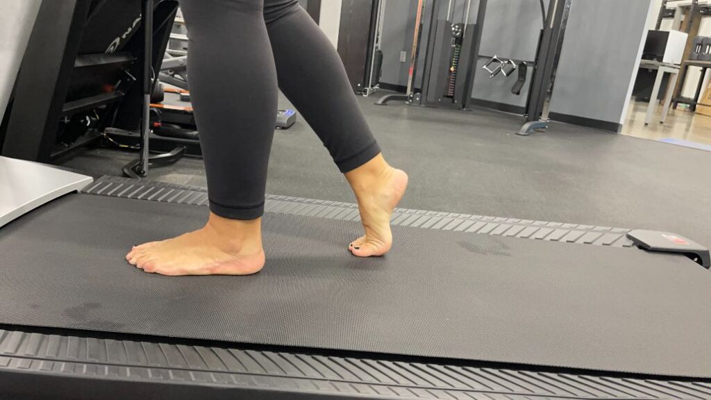 Bare feet on a treadmill
