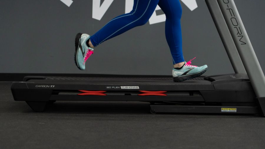 An image of feet in Brooks shoes running on a treadmill