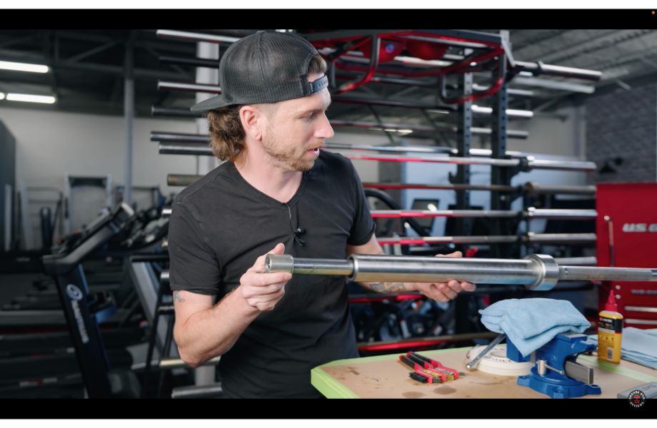 Sam removing barbell sleeve
